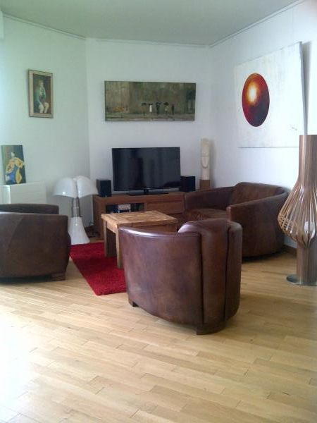 My set of Red Baron leather armchairs and my Diva living room light!