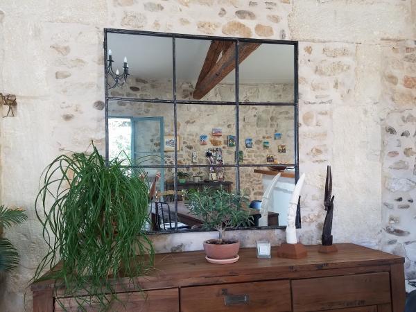 Superbe dans mon salon. Apport de lumière et vue sur le jardin.