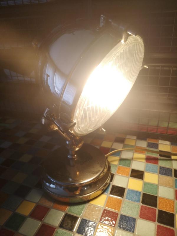 Lampe phare en métal argentée
