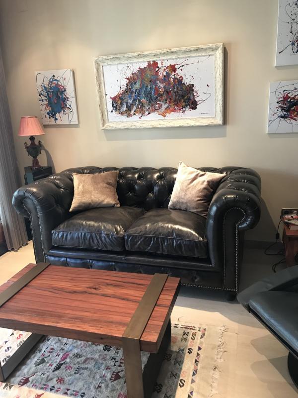 Canapé chesterfield en cuir brun