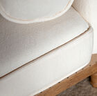 The seat cushion is removable, as are the cylindrical cushions