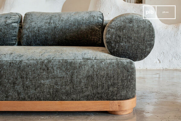 This 232 cm sofa makes a serene statement with its generous proportions and velvet texture