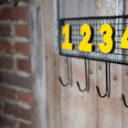 Hang on to the wall with two fixing points.