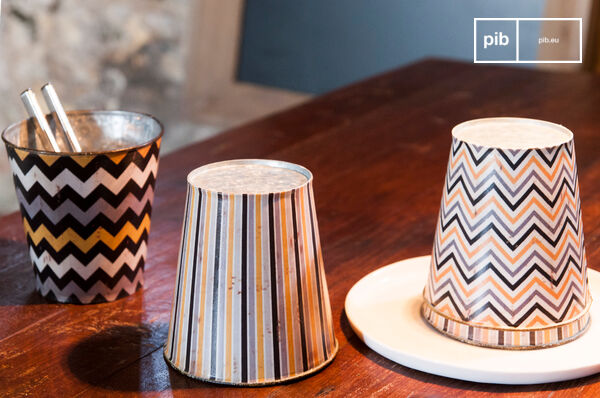 An aged effect adds a worn side to the pot covers.