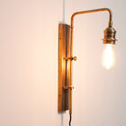 Wall lamp made of brass with retro charm.