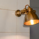 Aged brass wall sconce Bistrot