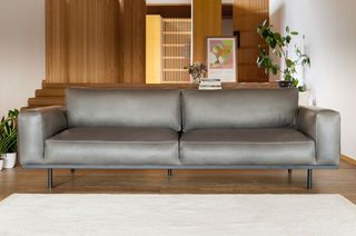 Amandel fauteuil in bruin leer