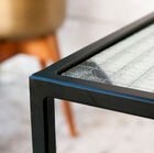 The structure of the table is a beautiful matt black colour.