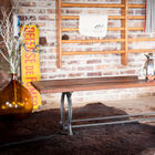 The whole displays a perfect combination of wood and cast iron.