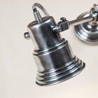 Applique orientable métallique plaquée argent.