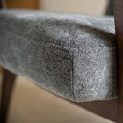The grey velvet upholstery adds a note of softness and elegance