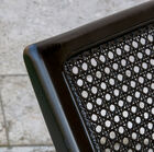 The colour of the chair is black, slightly shiny.