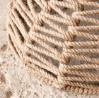 The structure of the stool hidden under the textile is made of metal.