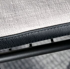 A remarkable level of finish, beautiful stitching and matt black structure.