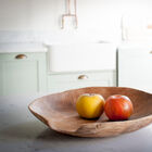 Beautiful teak plate full of charm.