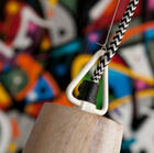 The braided power cable features a sublime zigzag pattern.