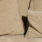 The cushions are dense and stuffed with feathers.