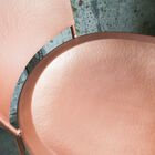 The seat has very slightly hammered finishes.