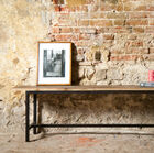 Nice solid wood bench with black metal legs.