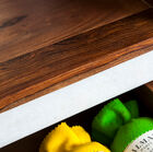 With its metallic feet and the elegance of the white marble which contrasts with the colour of the