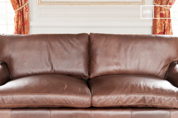 The deep seat is made of padded cushions.