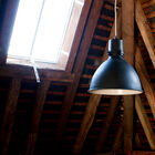 Black lamp with an industrial look in a rustic atmosphere.