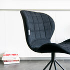 The chair has beautiful rounded lines.