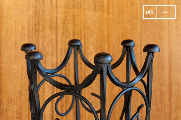 Detail of the iron arabesques on this unique storage.