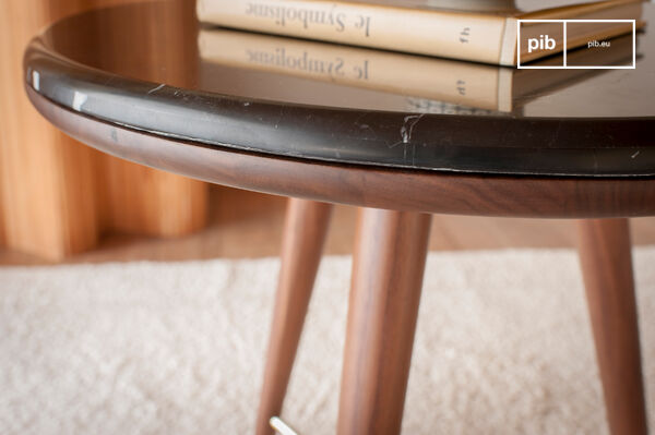 A bedside or side table, combining vintage elegance and superb finishes.