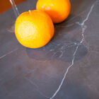 Beautiful black marble top with elegant and clear veins.