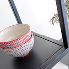 The rounded corners give a certain softness to the shelf.