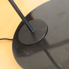 Lamp base in black marble with white veining.