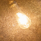 The smoked glass bubble has an original look.