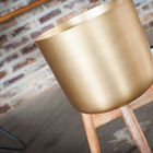 The legs are made of wood and perfectly accommodate the pot.