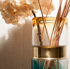 A beautiful golden ring completes the finishing touches of the vase.