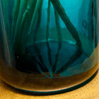 The bottom of the vase is tinted with a pretty transparent blue.
