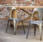 Industrial style chair in brushed metal.