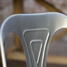 The curved backrest follows the shape of the back.