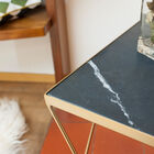 The marble is an elegant deep green, veined with white.