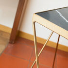 Beautiful green tray contrasting with the elegant golden structure.