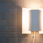 The elegant wall lamp set, like a butterfly with its wings unfolded.