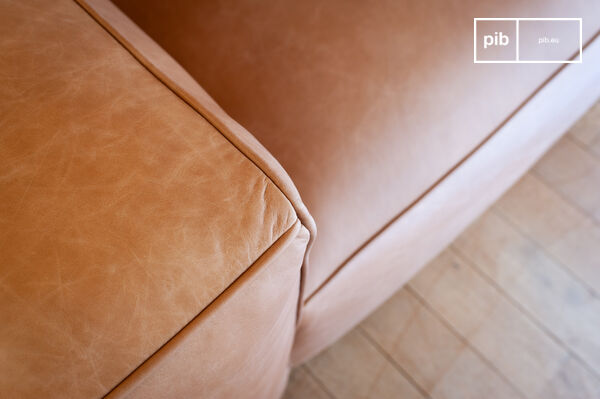 A sofa with taut lines and imposing dimensions