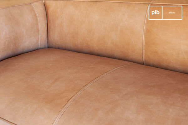 The Krieger sofa has a XXL format, square back and armrests of the same height, with clean lines