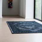 This carpet, made out of wool, brings a used look with it