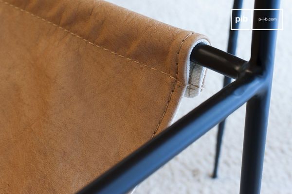 Thin matt black tubular structure contrasting with light leather.