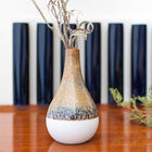 Pretty vase simple and delicate with a beautiful white base.