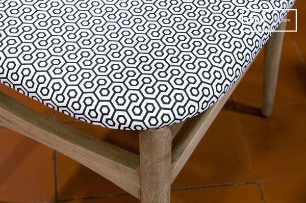 Beautiful black and white patterns decorate the chair.