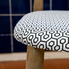 The seat is padded and comfortable.