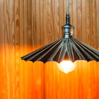 Suspension surmounted by a finely chiseled part.