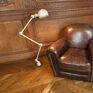 Beautiful armchair with a golden nailing.